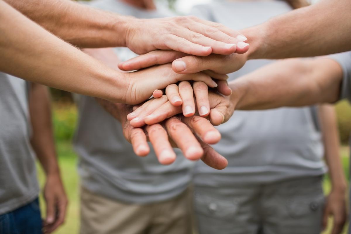 Team hands in the middle